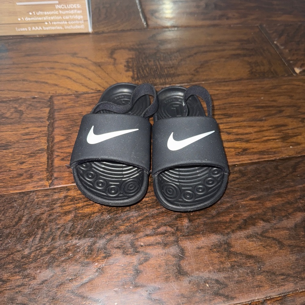 Nike Kids Black Sandals with White Swoosh